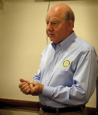 Wayne Rish explains microcredit to Winslow Rotary members during a meeting last week. Photo/Todd Roth