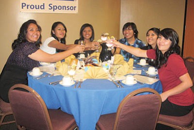 Hopi High National Junior Honor Society members raise their glasses to celebrate their  philanthropy award. Pictured from left, Lexie James, Mikayla Paul, Jennifer Lomayaktewa, Sheldon Nanacasia, LaKayla Adams and Crystal Jenkins. Stan Bindell/NHO