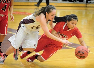 Marcella Joe goes for a steal during the Lady Bulldogs’ commanding 47-30 win over Page Dec. 18. Photo/Todd Roth