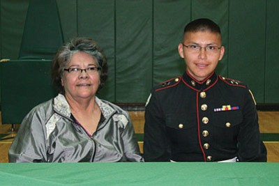 Tuba City High Senior Counselor June Birdsong sits next to Lok’a’a’ Neez Coolie, who was awarded a Marine Corp Naval Academy Scholarship for his high academic achievement at Tuba City High School. Photo/Rosanda Suetopka Thayer