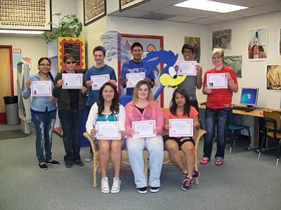 Holbrook High School recently announced its August Students of the Month. Sitting left to right: Tonya Jackson (math), Joy Briceland (social studies) and Guadalupe Benitez (female scholar-athlete). Standing left to right: Shoshanna Tom (NAVIT), Lonnie Williams (fine arts-drama), Colton Christensen (English), Woodvin Yazzie (science), Theron Johns (physical education) and Ryan Lewis (CTE). Not pictured: Kathlene Baldwin (reading), Shayna Carlson (second language-Spanish) and Shem Bowman (male scholar-athlete). Submitted photo
