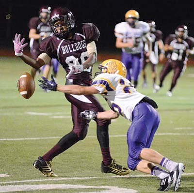 Winslow’s Demetrius Gamez can’t hold on to a pass during the Bulldogs’ 21-6 loss to Blue Ridge Sept. 6 at home. Photo/Todd Roth