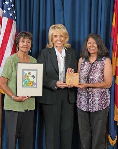 From left: Frances Quotskuyva, Arizona Governor Jan Brewer and artist Darlene James. Submitted photo