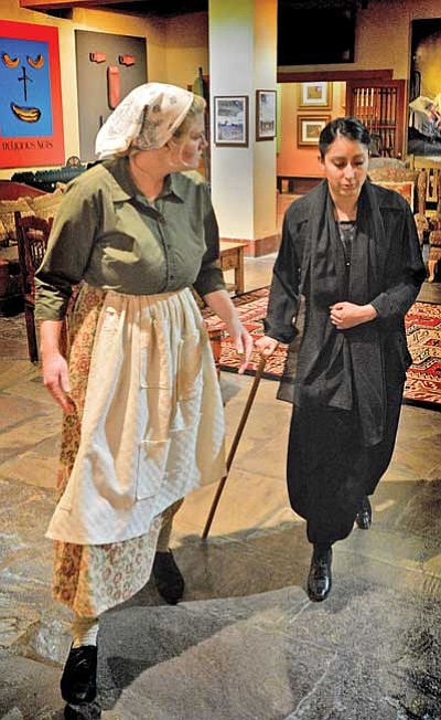 Grace Novak (left) and Katie Gardea perform a scene from “The House of Bernarda Alba.” Northern Arizona University theater students performed “The House of Bernarda Alba” at the La Posada Hotel in Winslow for six days. Photo/Todd Roth