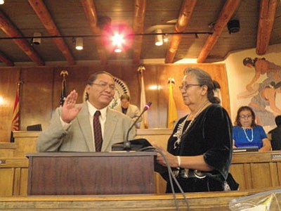 Associate Justice Eleanor Shirley Begay gives Malcolm Begay the oath of office July 23. Submitted photo