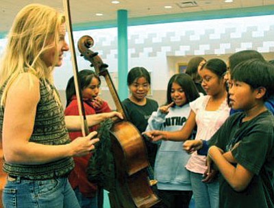 Dorothy Lawson works with Native American kids during a previous Grand Canyon Music Festival residency. Submitted photo
