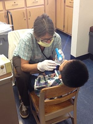 Oral health screenings are conducted on a regular basis at Leupp Public School by dental hygienist Ellen Grabarek.