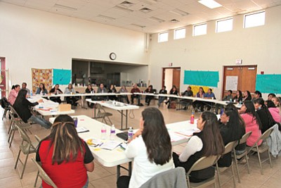 Representatives of the Hopi Department of Education, Guidance Center Programs and Northland Pioneer College, Village Youth Coordinators, Community Service Administrators, elementary school staff, school board members, Hopi Jr./Sr. High School administrators, Hopi Chairman Herman Honanie, youth participants and parents talk about issues affecting Hopi Youth Nov. 13-14 at the Hotevilla Youth and Elder Center. Photo/Stan Bindell