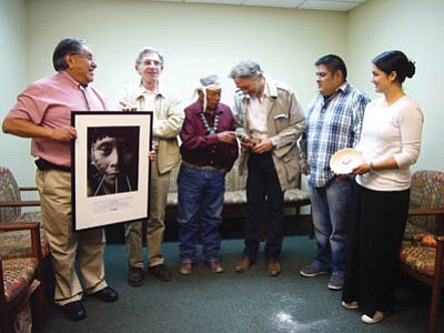 In July 2013, Pierre Servan-Schreiber returned a sacred object to the Hopi Tribe. Members of the Hopi Tribe, Survival International and Pierre Servan Schreiber exchange gifts after the return of the sacred object. File photo
