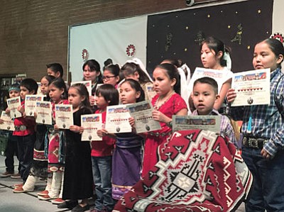 Tuba City Primary School students in the Navajo Language program show off their language skills to their parents and community at a dinner honoring their accomplishments Dec.10.Rosanda Suetopka/NHO