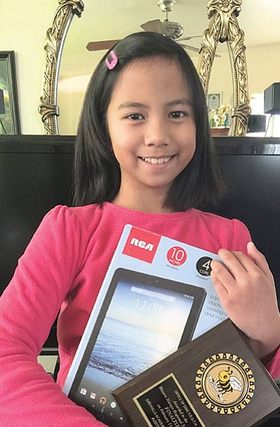 Maria Macaraig, age 9, is the Western Navajo Agency 2016 Spelling Champion from Tuba City Primary School.  Macaraig took the top spot after spelling “clandestine” correctly.  She will now go onto to the larger Navajo Nation Spelling Bee in Crownpoint, New Mexico next month to compete. Photo/Rosanda Suetopka