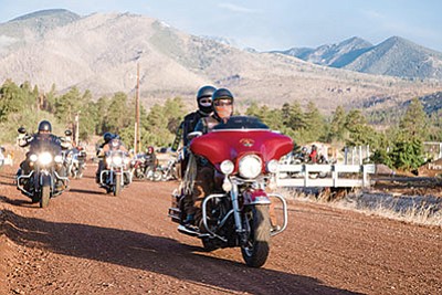 The Navajo Hopi Honor Riders leave the Piestewa House May 18. The group honors Native Americans serving in the military or killed in the line of duty.  Ryan Williams/NHO