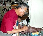 Photo courtesy of Flagstaff Cultural Partners 
Baje Whitethorne Sr. at work in his studio.