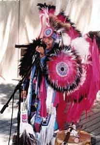 Stan Bindell/Observer
<BR><BR>
Allenroy Paguin, at the Prescott Indian Art Market July 9 and 10, demonstrated fancy dancing and played the flute. He also had his jewelry on display.
