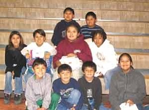 Photo by Regina Akee
These five first graders at Dzil Libei Elementary recently were recognized for perfect attendance.