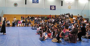 Miss Navajo Nation Jocelyn Billy (above left) addresses the large crowd at the Tonalea School Wellness Fair held Dec. 13 in Tonalea (Photo by Christopher Curley).