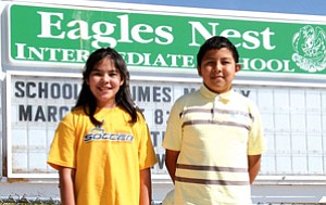 Spelling wizards Kyra Kaya (left) and Kenard Dillon recently proved their spelling skills and will advance to the state competition (Photo by Byron Poocha).