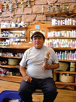 Philbert Honanie demonstrated his carving and painting techniques throughout the Hopi kachina doll carver show at Winter Sun. He is credited by many young carvers for mentoring them in the old style and is a Winter Sun favorite who truly enjoys passing his knowledge on (Photo by S.J. Wilson/Observer).