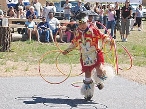 Tyrese Jenson performs the hoop dance at last year’s Labor Day celebration held in Tusayan (Photo by Gary Elthie/Observer).
