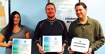 From left: Cherokee Nation employees Tabbatha Revas, Jerrid Diffee and Jason White all received awards from the U.S. Environmental Protection Agency for their dedication in building relations between the group and the tribes (Courtesy photo).