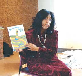 Navajo First Lady Vikki Shirley reads to students at the Navajo Nation Museum and Library on March 17.