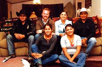 <i>Courtesy photo</i><br>
Morgan Spurlock (back row, second fron left) sits with his Navajo host family, the Dennisons. Top row (left to right): Kyle, Morgan Spurlock, Deborah and Karl. Bottom row: Kassidy and Devyn.