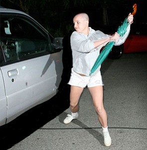Britney attacks the paparazzi.