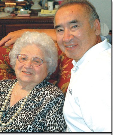 Eva Gilbert poses with Cherokee Nation Deputy Principal Chief Joe Grayson Jr. recently on her birthday. Gilbert, a Cherokee Nation citizen who turned 106 this year, is proud of her heritage and continues to be an active volunteer in her community.