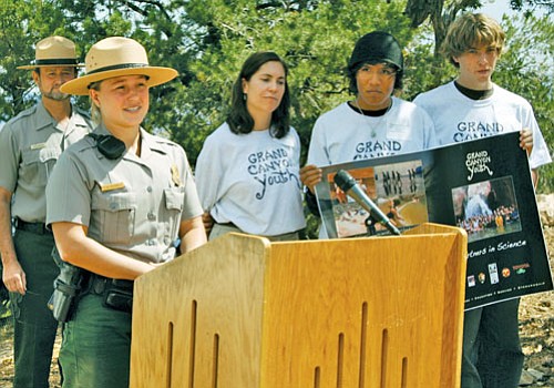 <i>Photo by Jackie Brown/WGCN</i><br>
Park Ranger Angela Boyers speaks as members of Grand Canyon Youth stand behind her.