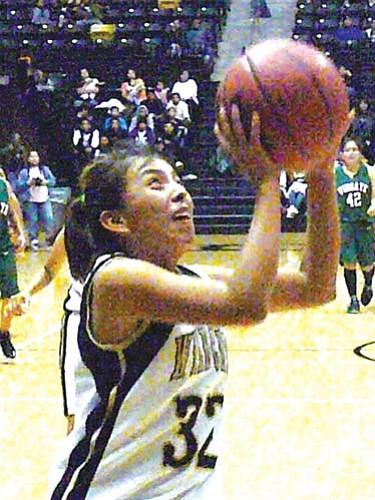 <i>Photo by Anton Wero/NHO</i><br>
Chinle Lady Wildcat’s Samantha Pahe (32) drives the lane for two points in their win over the Wingate Lady Bears, 58-47.