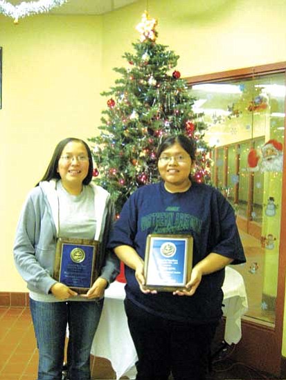 Diana Fernando and LeAnna Leyva were good students as they earned a trip under the Christmas tree. They both won awards in journalism.