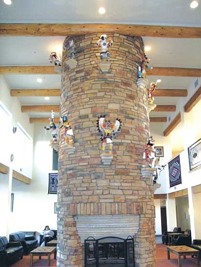 An ornately built stone fireplace greets visitors and guests of the View Hotel.