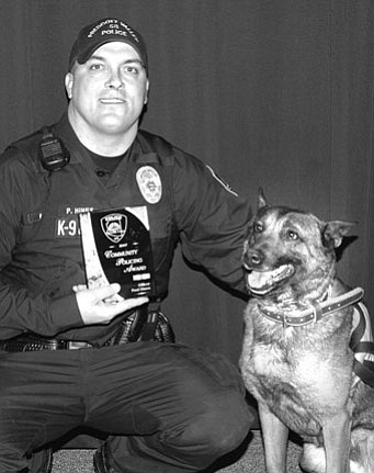 Officer Paul Hines and “Joey” earned a Community Policing citation this past year for their service and professionalism as a team fighting crime in Prescott Valley.<br>
<i>TribPhoto/Heidi Dahms Foster</i>
