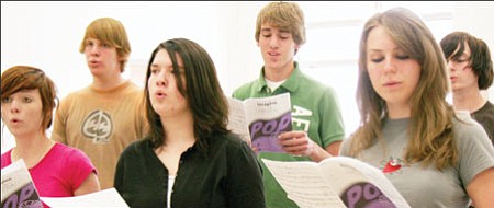 Members of the Bradshaw Mountain High School Chamber Choir practice Tuesday morning for their upcoming concert performances. From left are Sharayah Krauser, Chris Galinski, Katie Spears, Paul Wiser, Miranda Palmarozza, and Andrew Swick.<br>                          TribPhoto/Sue Tone