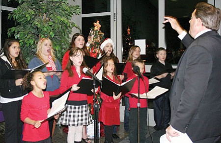 Students entertain visitors to the Civic Center at a past Holiday Festival of Lights, scheduled to begin at at 5 p.m. Friday.<br>
FilePhoto/Sue Tone