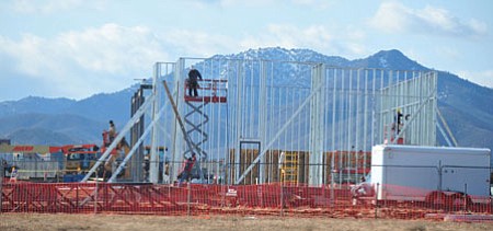 Workers frame up what will be the Maverik service station at the intersection of Glassford Hill Road and Lakeshore Drive in Prescott Valley last Wednesday.<br>
Photo Courtesy Les Stukenberg