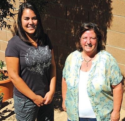 Robin Burke, right, executive director of Stepping Stones, with incoming director of the shelter Liz Murrieta pose Thursday morning in the backyard of the shelter’s location.<br>
Photo courtesy of Brett Soldwedel/The Daily Courier