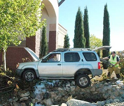 A woman driving this Nissan Xterra suffered head injuries in a t-bone accident midday Monday. <br>TribPhoto/Cheryl Hartz