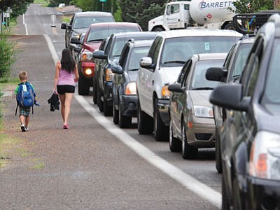 Traffic backs up along Addis Avenue and Cattletrack Drive near Coyote Springs Elementary School in Prescott Valley as school prepares to be let out for the day on Monday.<br>
Photos courtesy Les Stukenberg