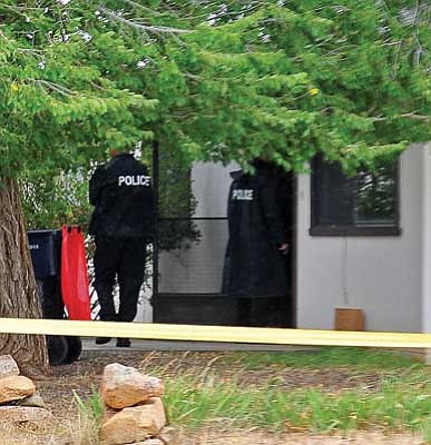 Prescott Valley police investigate a Thursday double homicide near Robert Road and Lakeshore Drive. Daniel Wood said there was initially nothing to indicate it was not “an ordinary day.”<br>
Photo courtesy Matt Hinshaw