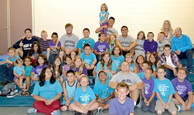 Lake Valley fifth-graders kick off Mac-Ro Math program with ERAU wrestlers.<br>Courtesy Photo