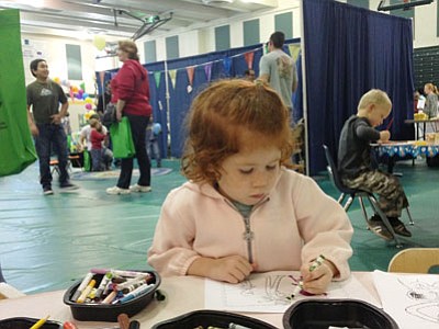 Alice Mattingly, 3, at an art booth during the Kindergarten Transition and Resource Fair.<br>
Courtesy photo