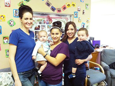 Jasmine Demaline, RN, and some of her clients at the Teen Outreach Pregnancy Center in Prescott Valley<br>
Courtesy Photo