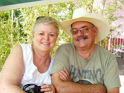Jim and Rita Riley, shown here on their first trip to Africa in 2008, will travel to Africa next month for Jim’s fifth trip and Rita’s second, teaching pastors and visiting orphans and schoolchildren.<br>
Courtesy Photo