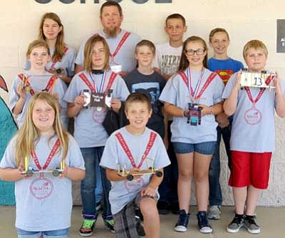 Courtesy Photo<br>
Coyote Springs Elementary School Solar Racecar team Participated in the Skills USA Arizona Championships, with two students winning the gold and silver medals. Front row, from left, are Alexa Davis and Dane Holloway. Middle row, from left, are Cassidy Blake, gold medal winner Whittney Trueblood, Connor Merritt, silver medal winner Grace Poitras and Brandon Bailey. Back row, from left, are Morgan Ju, Skills USA advisor Brent Welsh, Cameron Setzer and Alex Cabral.
