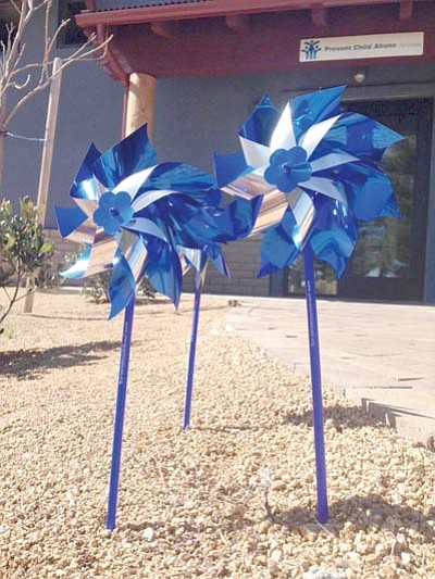 Courtesy photo<br /><br /><!-- 1upcrlf2 -->The blue pinwheel is the national symbol of happy, healthy children.