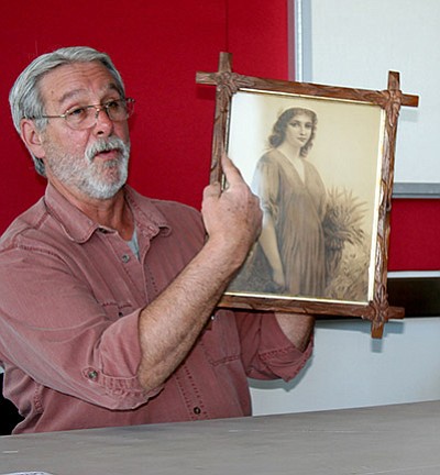 Trib Photo/Sue Tone<br /><br /><!-- 1upcrlf2 -->David Vigne, with Granite Creek Antiques, said this Italian print of "Ruth in the Field" has a wood backing that should be removed. From the 1860-1870s, he valued the print between $45-$100.