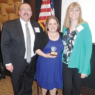 Bethany Masters, center, is Yavapai County’s 2015 Teacher of the Year as a Cross Grade Specialist (9th-12th Grade).