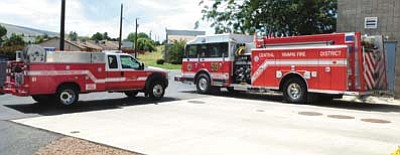 Chief Scott Freitag has big plans that come in a small package, as he believes outfitting a patrol truck, like the one shown here next to CYFD’s Engine 59, could relieve the wear and tear on full-size fire engines by responding to medical calls and small fire incidents.<br /><br /><!-- 1upcrlf2 -->(Les Stukenberg/Daily Courier)