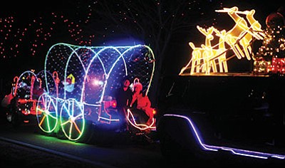 This wagon-inspired float was one of the top winners at Friday’s Holiday Festival of Lights parade. (Les Stukenberg/PNI)